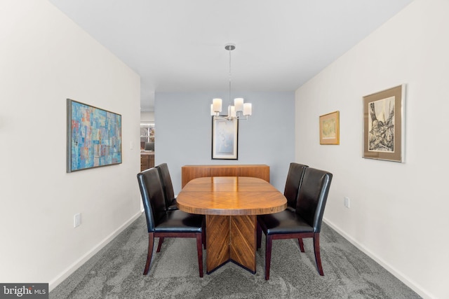 carpeted dining space with a chandelier