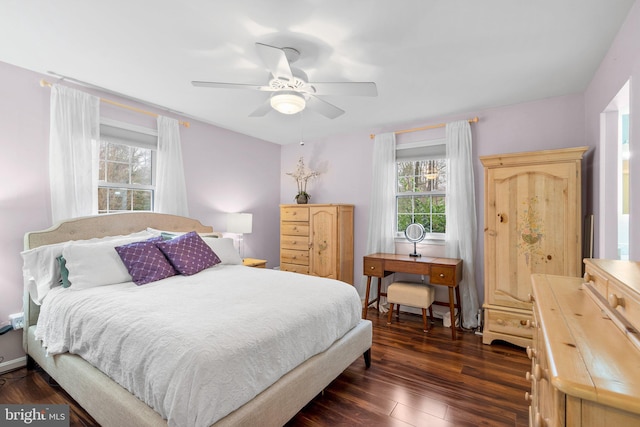 bedroom featuring ceiling fan and dark hardwood / wood-style floors