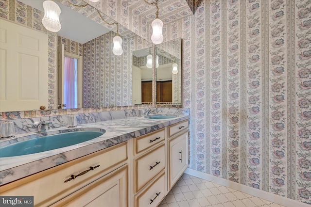 bathroom featuring tile patterned floors and vanity