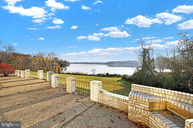 view of yard with a water view