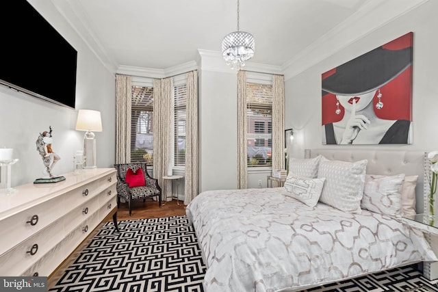 bedroom featuring dark hardwood / wood-style floors, crown molding, and an inviting chandelier