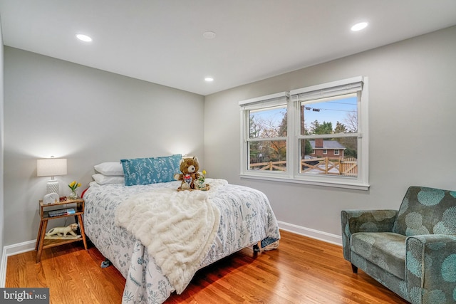 bedroom featuring hardwood / wood-style flooring