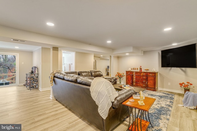 living room with light hardwood / wood-style floors