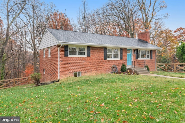 view of front of property featuring a front lawn