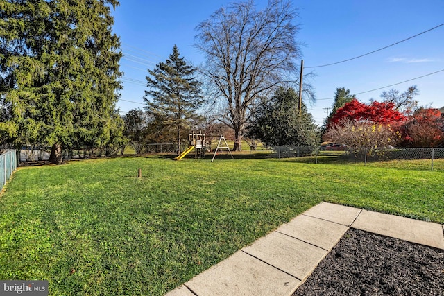 view of yard featuring a playground