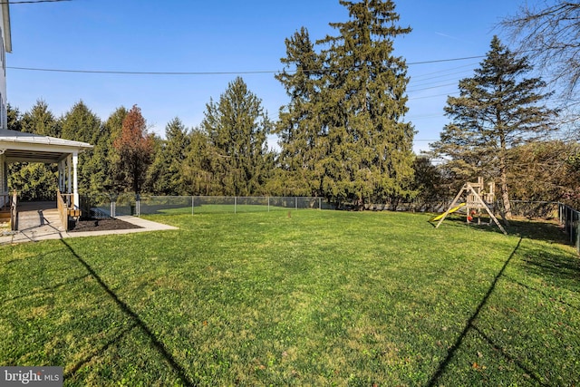 view of yard featuring a playground