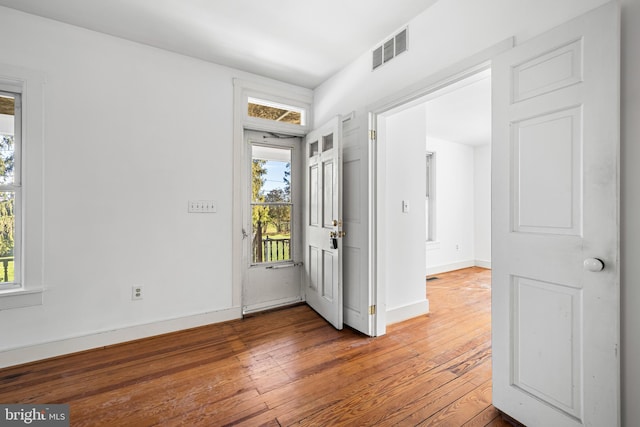 foyer entrance featuring hardwood / wood-style flooring