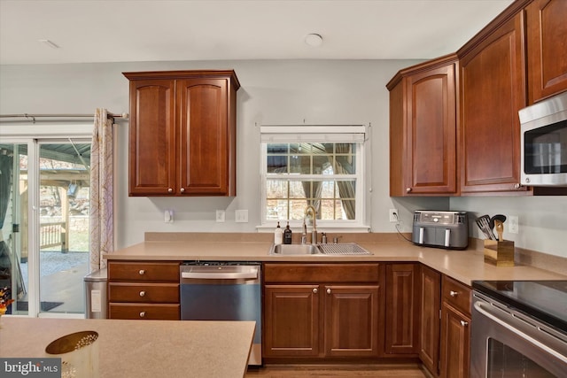 kitchen with sink and stainless steel appliances