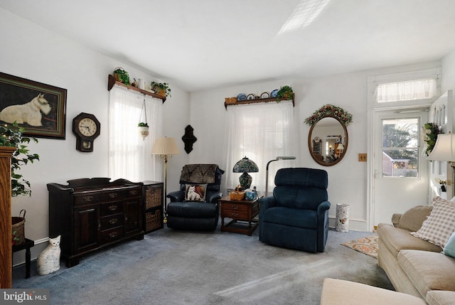 carpeted living room with plenty of natural light