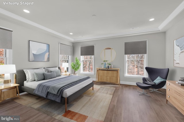 bedroom with recessed lighting, dark wood finished floors, visible vents, and baseboards