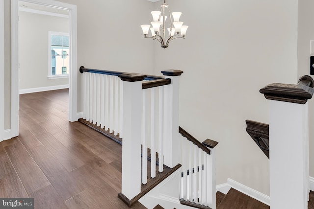 714 Walkers Mill Ln, Wilmington, DE 19807 - stairs with wood finished floors, a chandelier, and baseboards