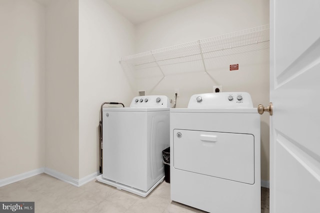 laundry area featuring washing machine and dryer