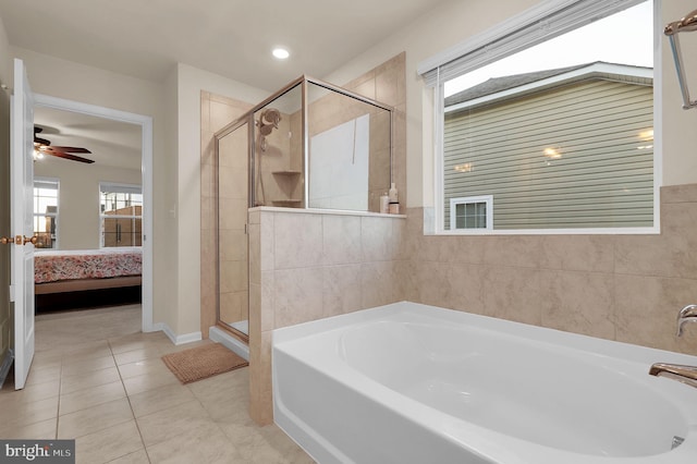 bathroom featuring tile patterned floors, separate shower and tub, and ceiling fan