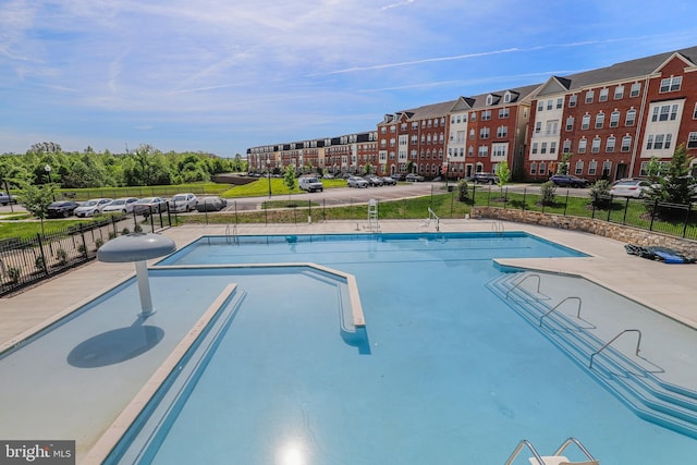 view of swimming pool featuring a patio