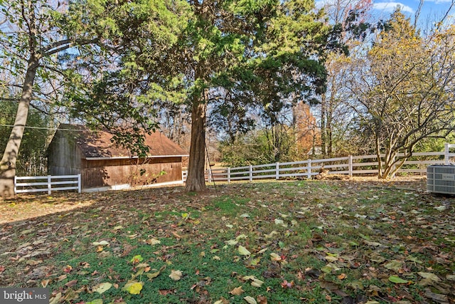 view of yard with central AC