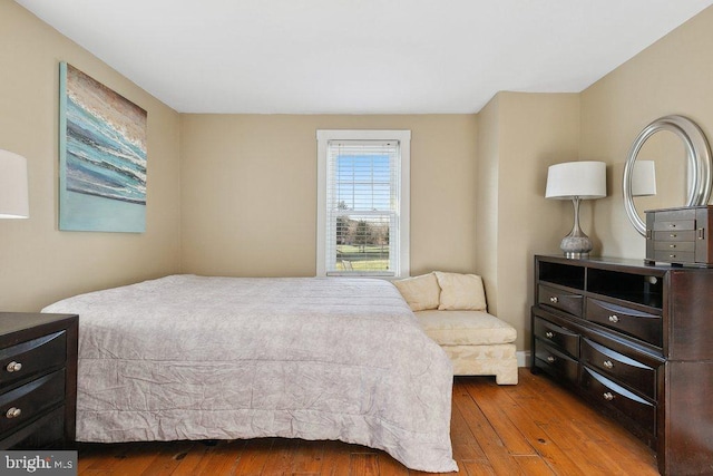 bedroom with light wood-type flooring