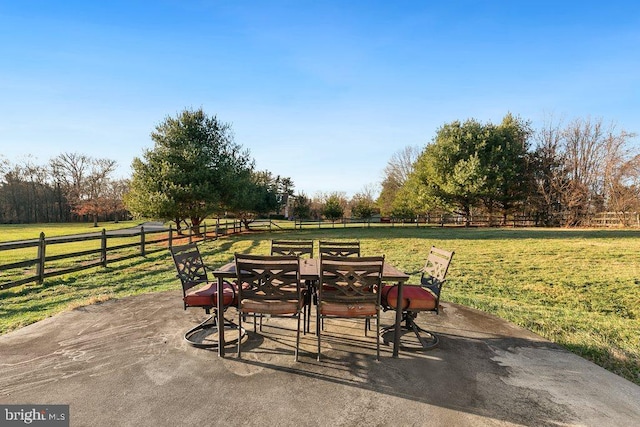 view of patio / terrace with a rural view