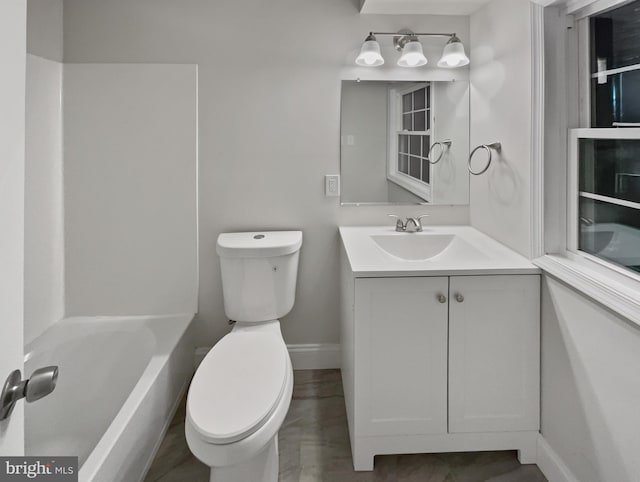 bathroom with vanity, hardwood / wood-style flooring, and toilet