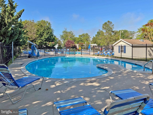 view of pool with a patio