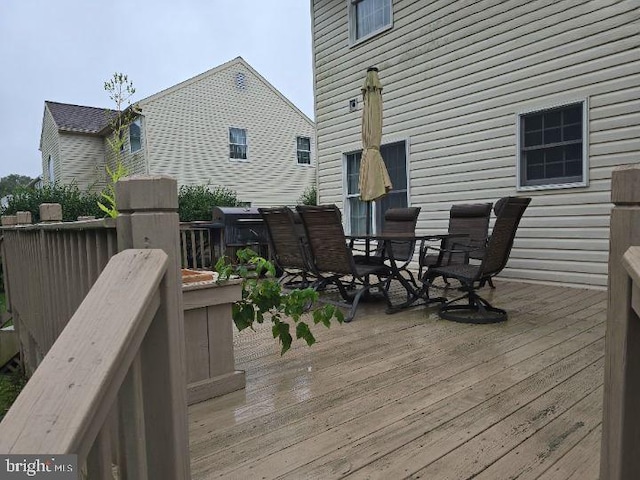 deck featuring outdoor dining space