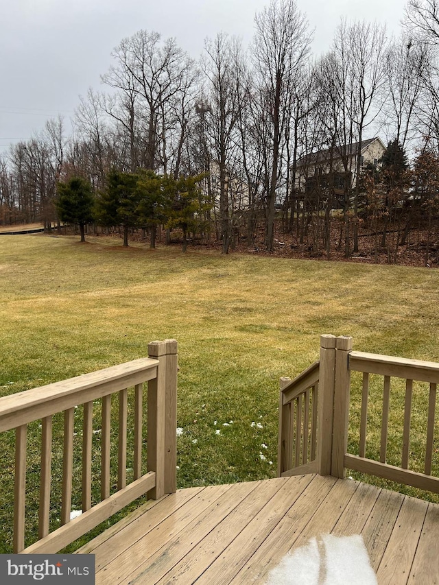 deck featuring a lawn