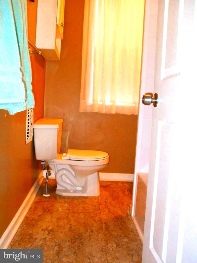 bathroom featuring toilet