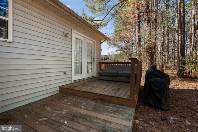 wooden terrace with grilling area