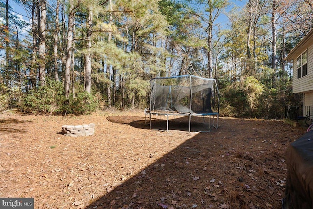 view of yard featuring a trampoline