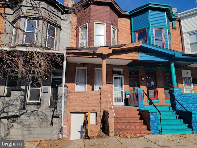 view of front of home featuring covered porch