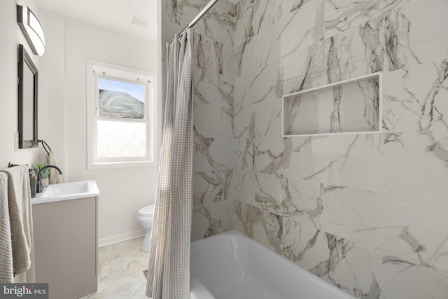 full bathroom featuring vanity, toilet, and shower / tub combo with curtain