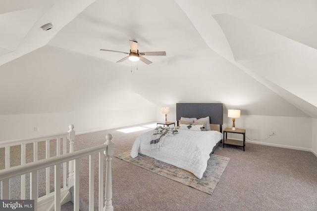 bedroom with ceiling fan, lofted ceiling, and carpet floors