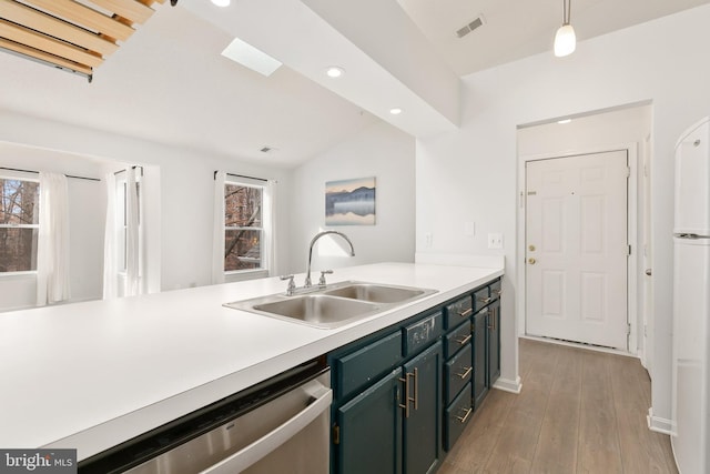 kitchen with dishwasher, decorative light fixtures, a healthy amount of sunlight, and sink