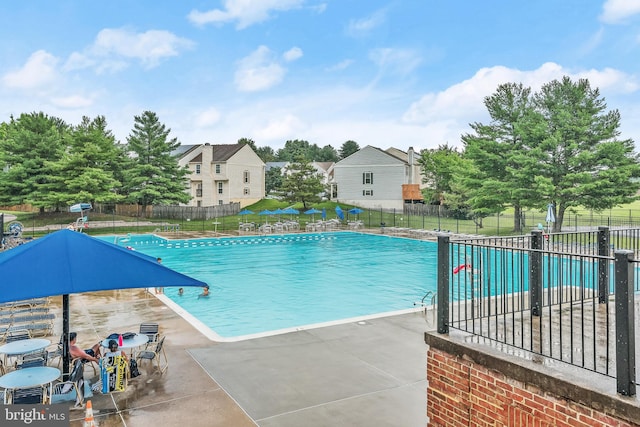 view of swimming pool featuring a patio