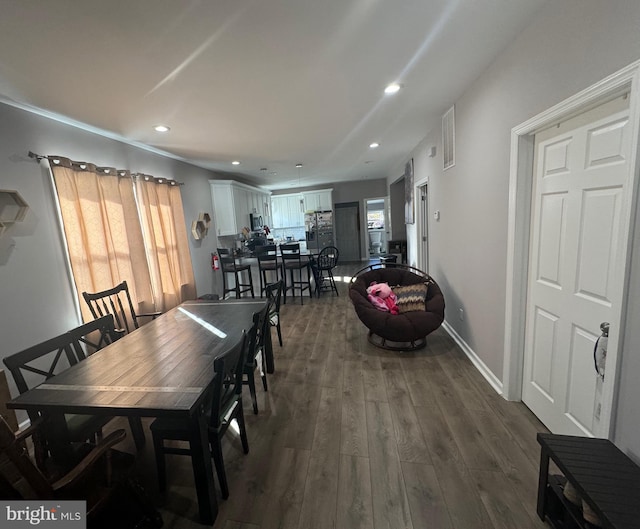 dining room featuring dark hardwood / wood-style floors