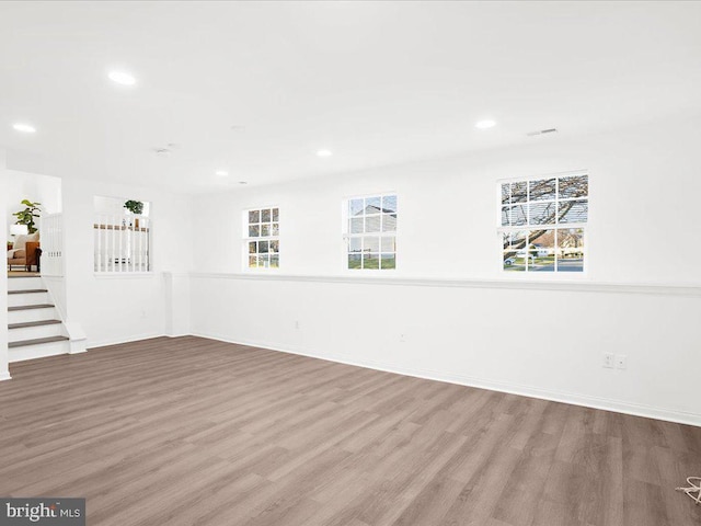 unfurnished room featuring light hardwood / wood-style floors