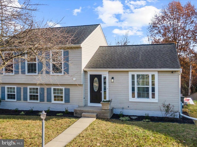 view of front of house with a front lawn