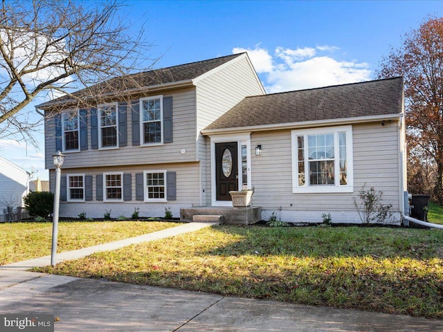 view of front of home with a front yard