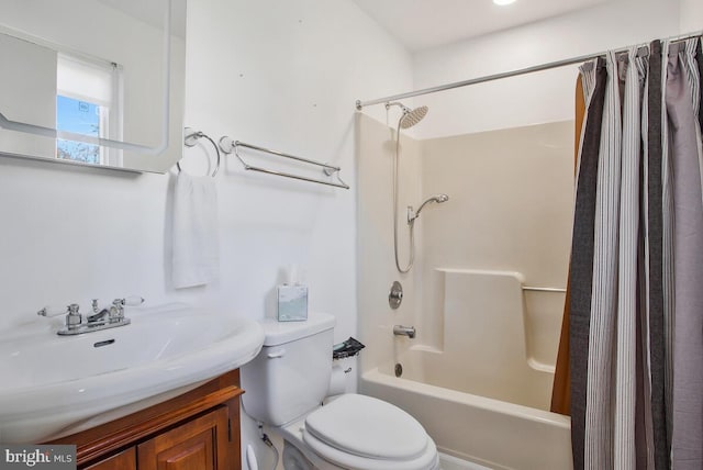 full bathroom with shower / bath combo with shower curtain, vanity, and toilet