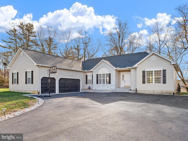 single story home with a garage