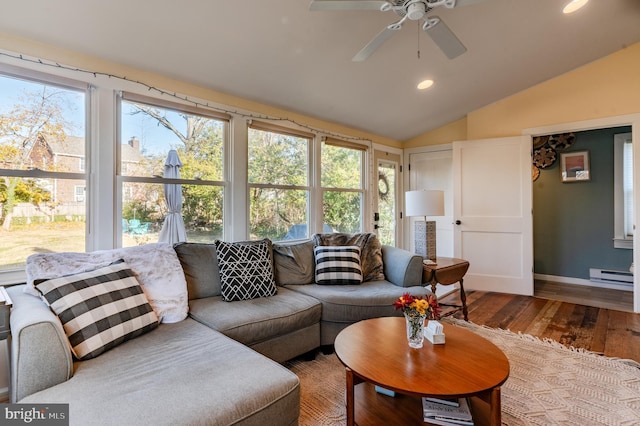 living room featuring ceiling fan, wood-type flooring, lofted ceiling, and a baseboard heating unit