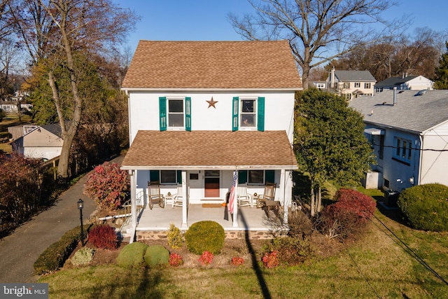 front of property featuring a porch