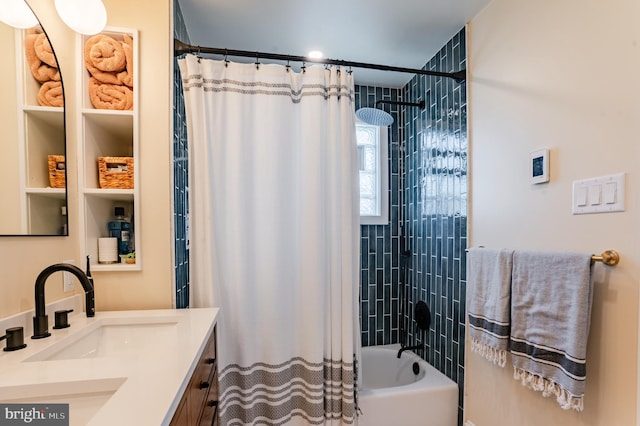 bathroom with vanity and shower / bath combo with shower curtain