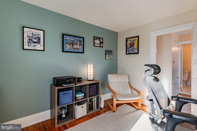 office space with hardwood / wood-style floors