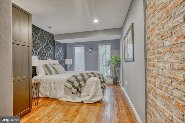 bedroom featuring light wood-type flooring