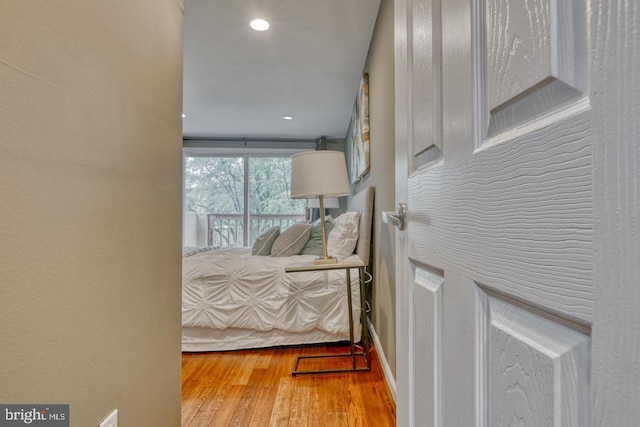 bedroom featuring hardwood / wood-style flooring