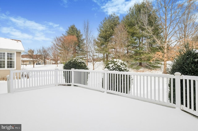 view of snow covered patio