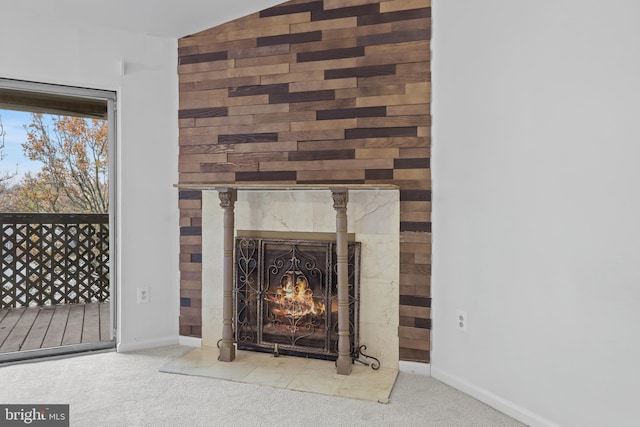 interior details featuring wood walls and carpet