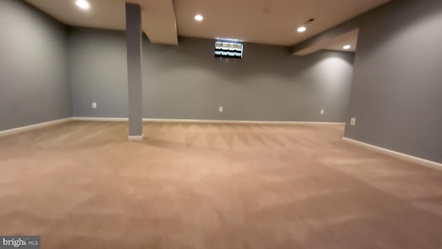 basement with carpet flooring