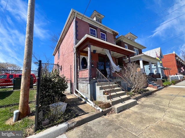 view of front facade featuring covered porch