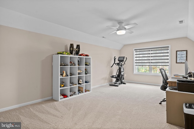 home office featuring ceiling fan, light colored carpet, and vaulted ceiling